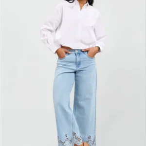 Jeans wide leg med blombroderi vid benslut blå