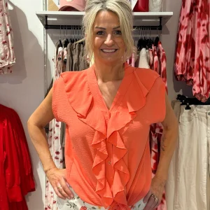 Topp med volang och knyt korall